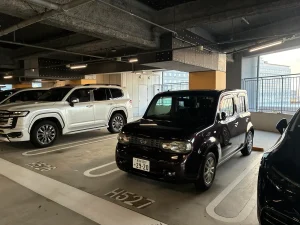 2026年3月11日 羽田空港第3ターミナルで一時帰国のお客様へ日産 キューブを宅配納車